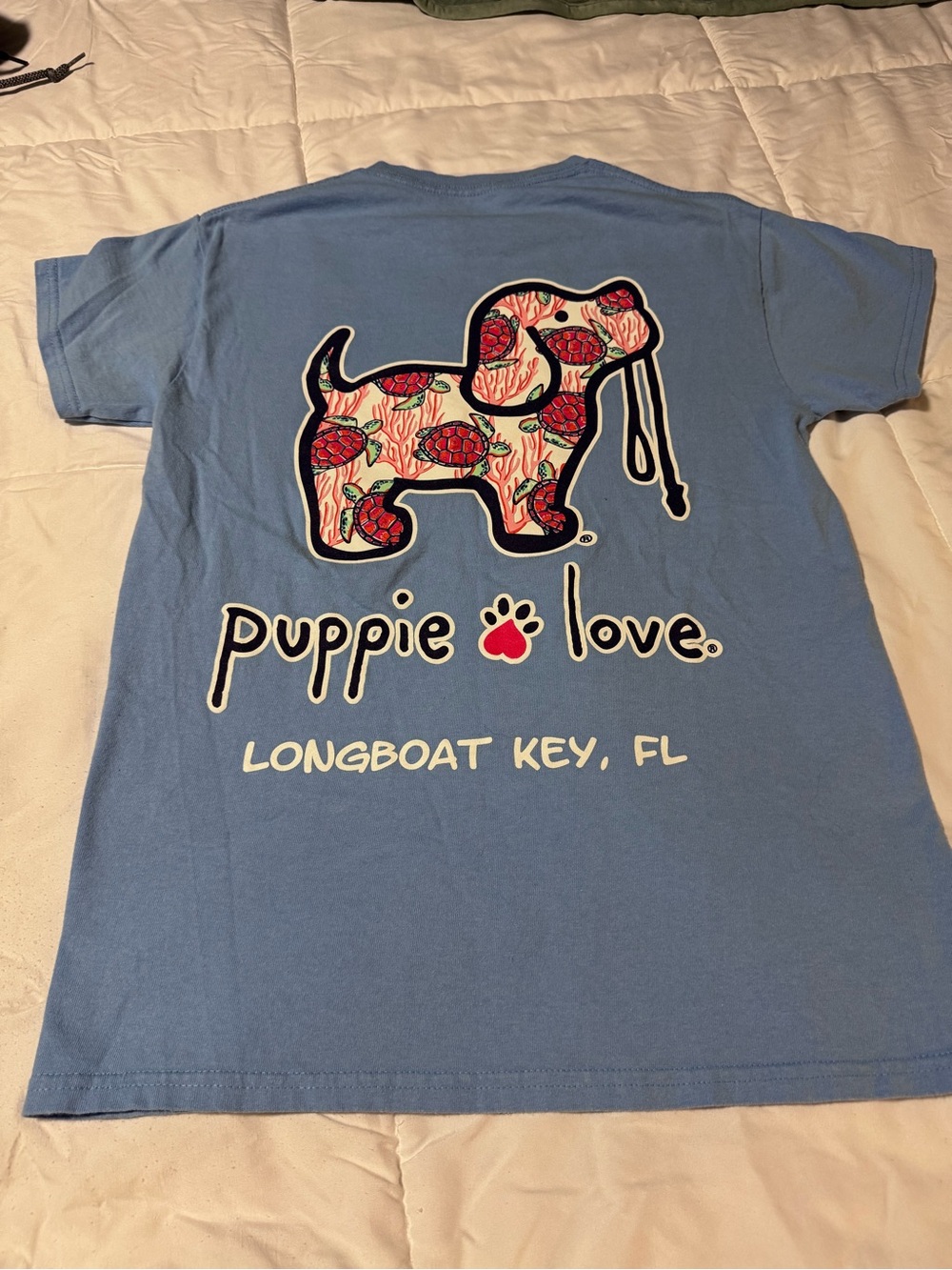 Puppie Love Longboat Key, FL graphic tee with sea turtle print in puppy graphic